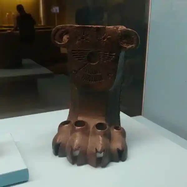 Assyrian symbol on a lion paw chair leg